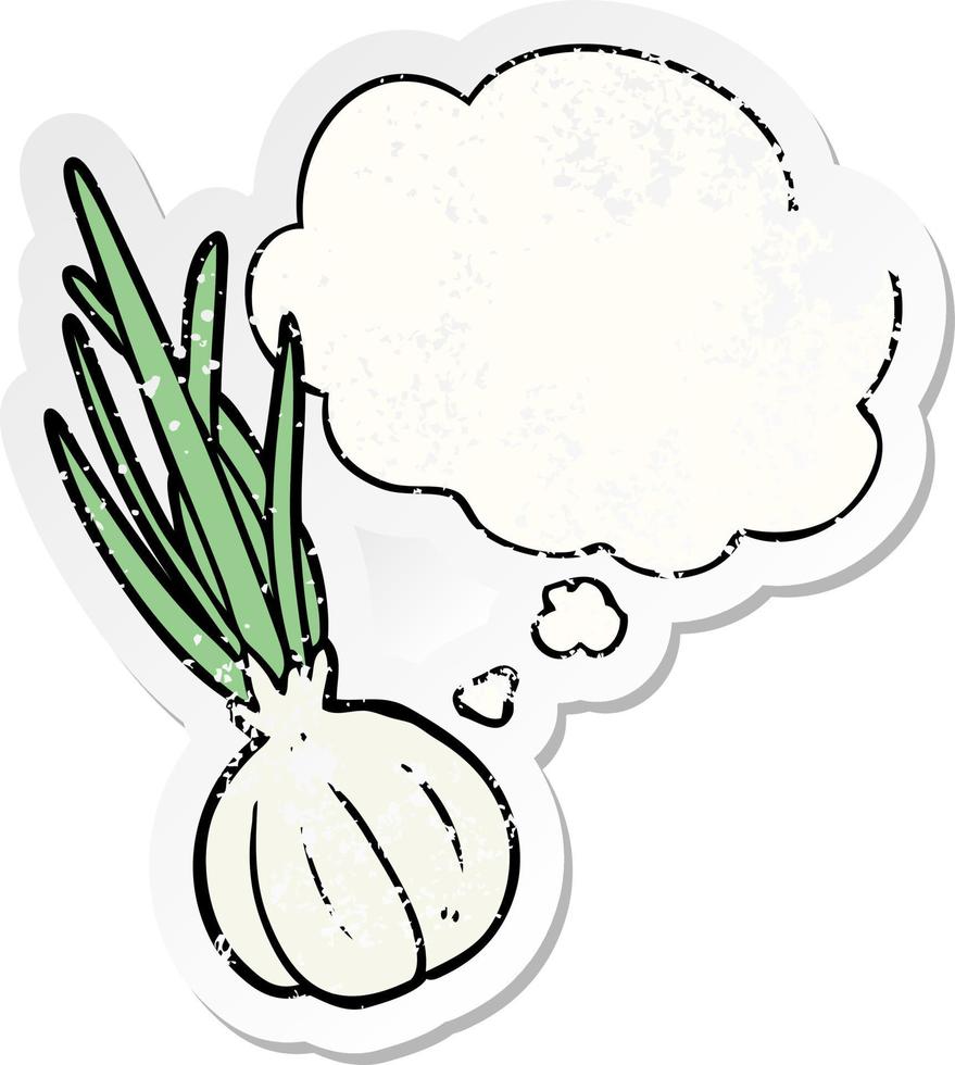 cartoon garlic and thought bubble as a distressed worn sticker vector