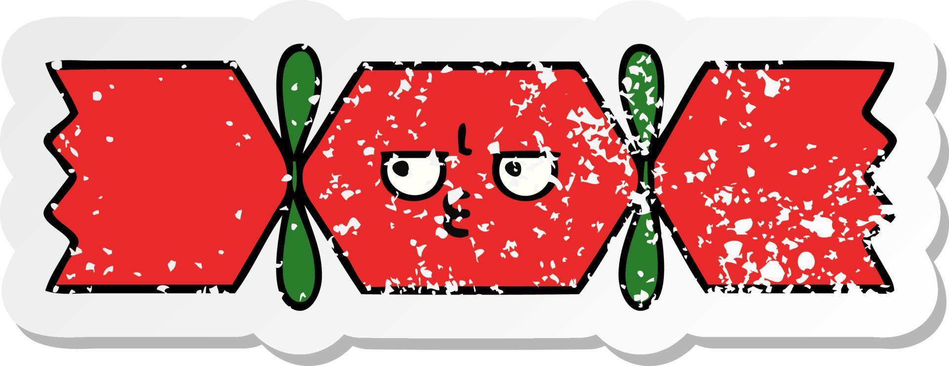 distressed sticker of a cute cartoon christmas cracker vector