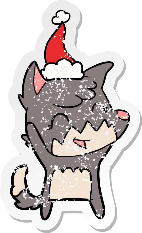 happy distressed sticker cartoon of a fox wearing santa hat vector