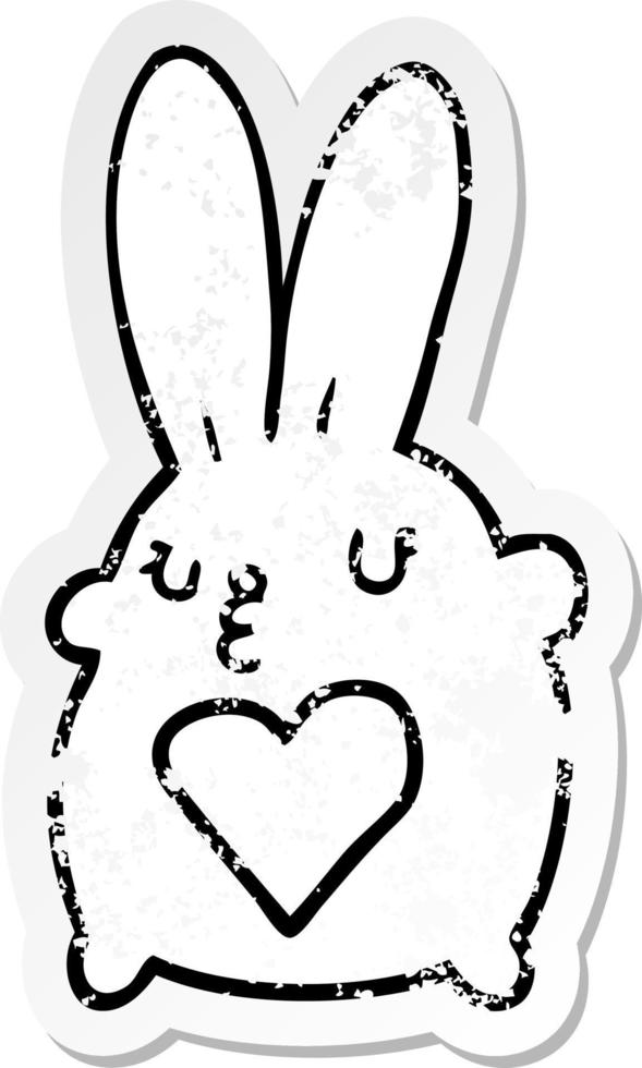 distressed sticker of a cute cartoon rabbit with love heart vector