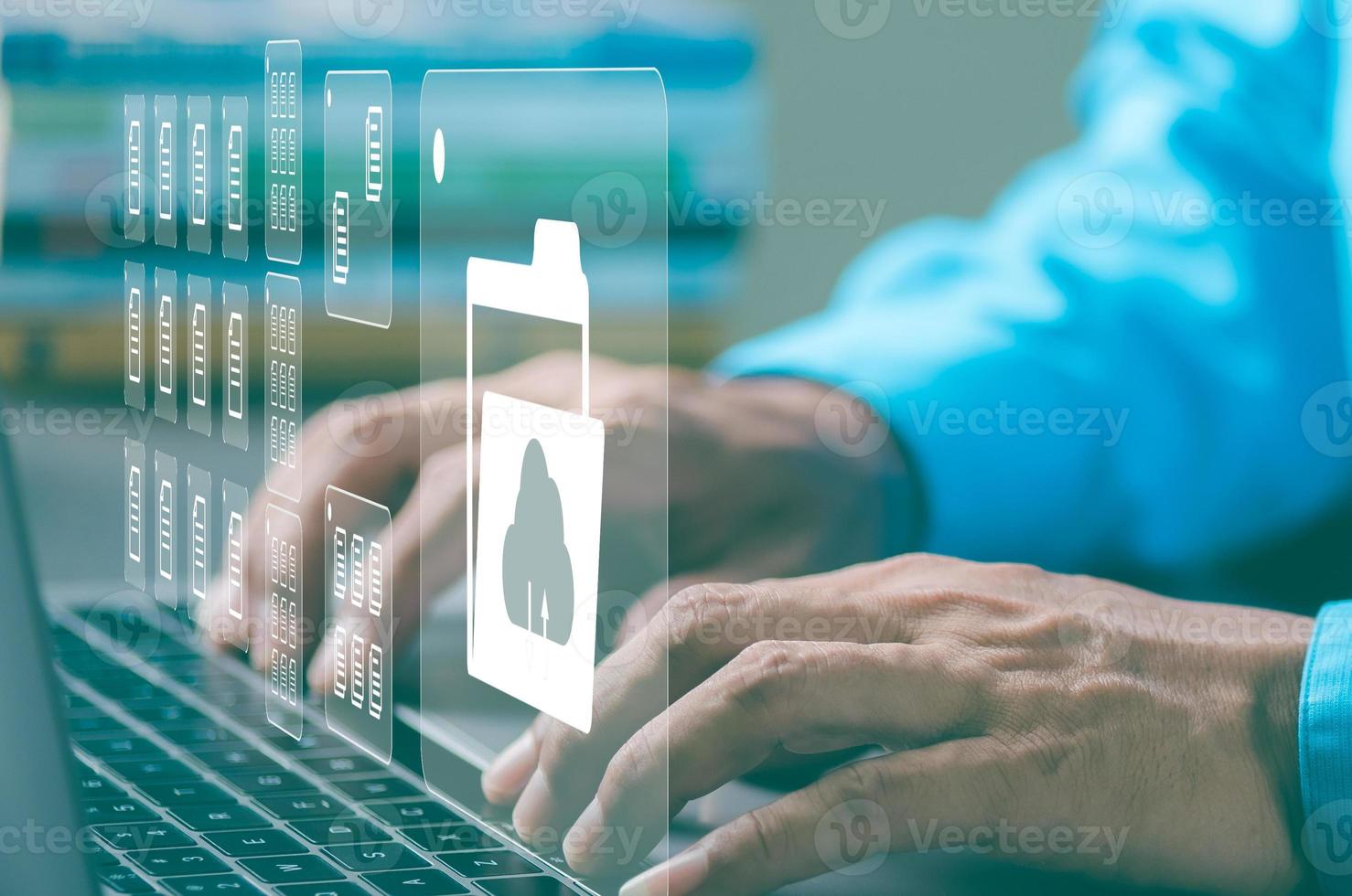 Young businessman working in front of computer, Document Management System photo