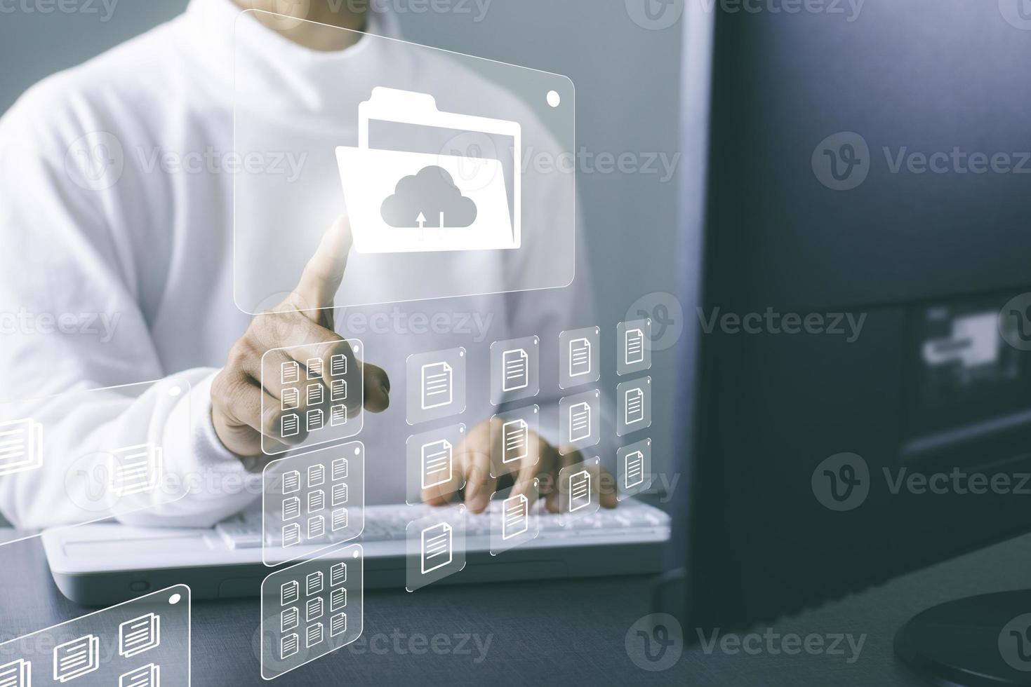 Businesswoman working in front of a computer, Document Management System photo