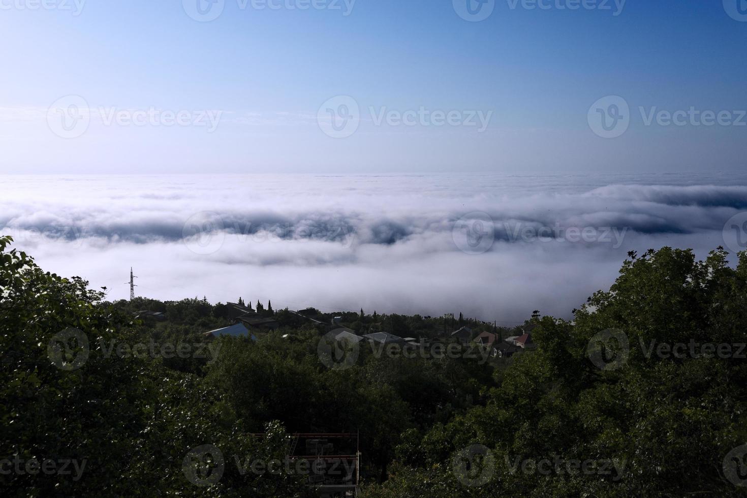 Morning, thick fog over the Black Sea. View from the ridge. photo