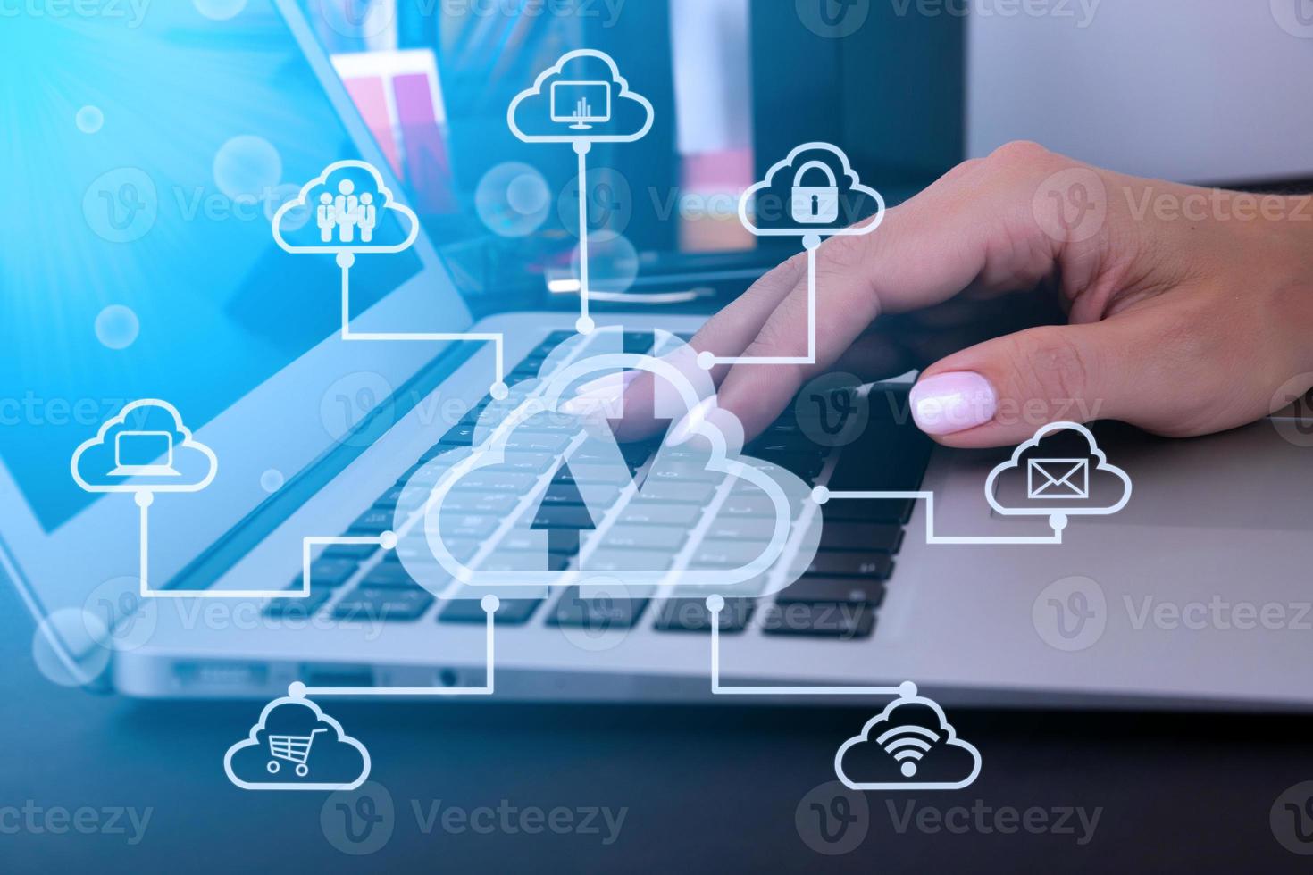Business woman using laptop computer with virtual cloud technology with icon. Cloud technology big data management includes business strategy, customer service. photo