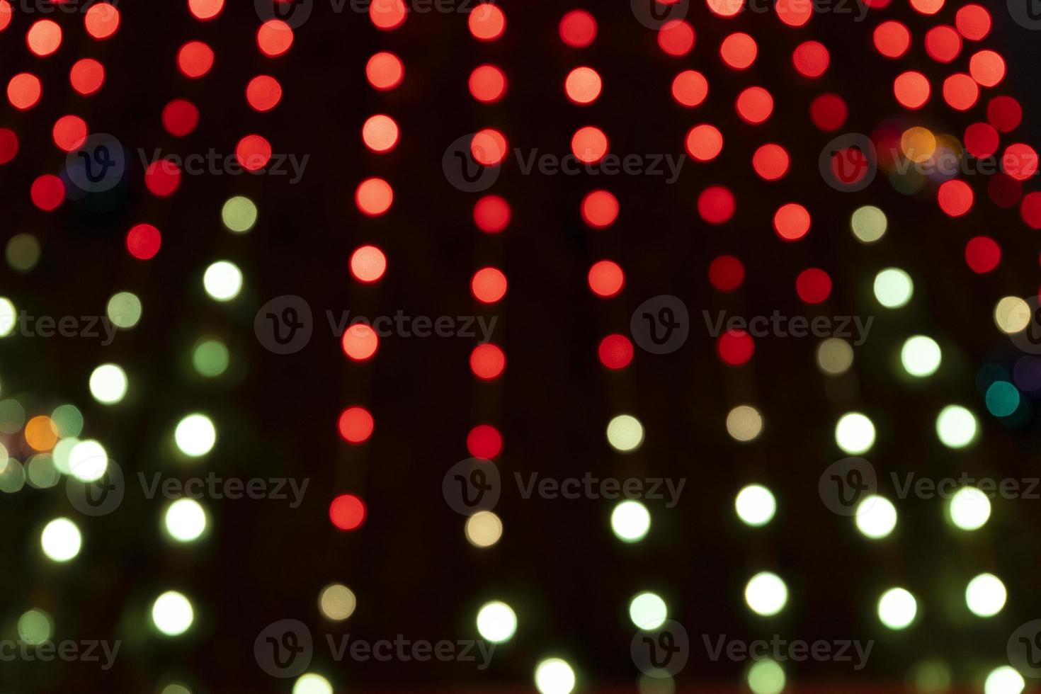 fondo de navidad, luces de neón multicolores brillantes. copie el espacio fuera de foco foto