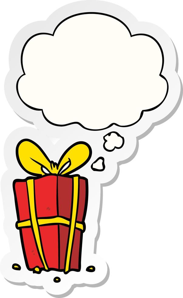 cartoon xmas present and thought bubble as a printed sticker vector