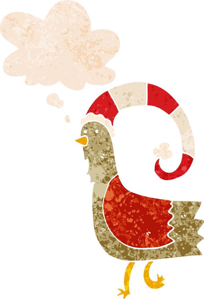 pollo de dibujos animados con un divertido sombrero de navidad y una burbuja de pensamiento al estilo retro texturizado vector