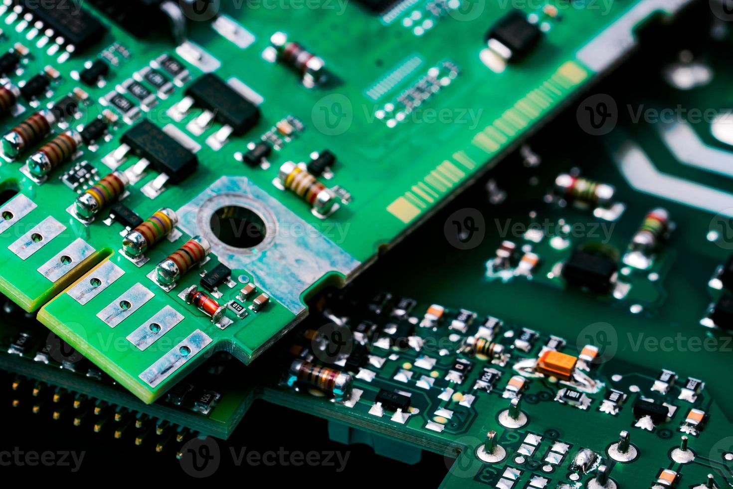 Electronic circuit board. Semiconductor motherboard circuit board technology. Mainboard of computer. Integrated semiconductor microchip on green circuit board. Hi-tech industry and computer science. photo