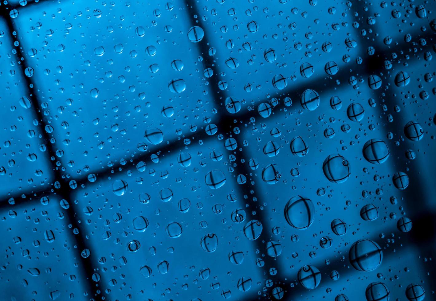 Blue abstract blur background with water drops and reflection on ...