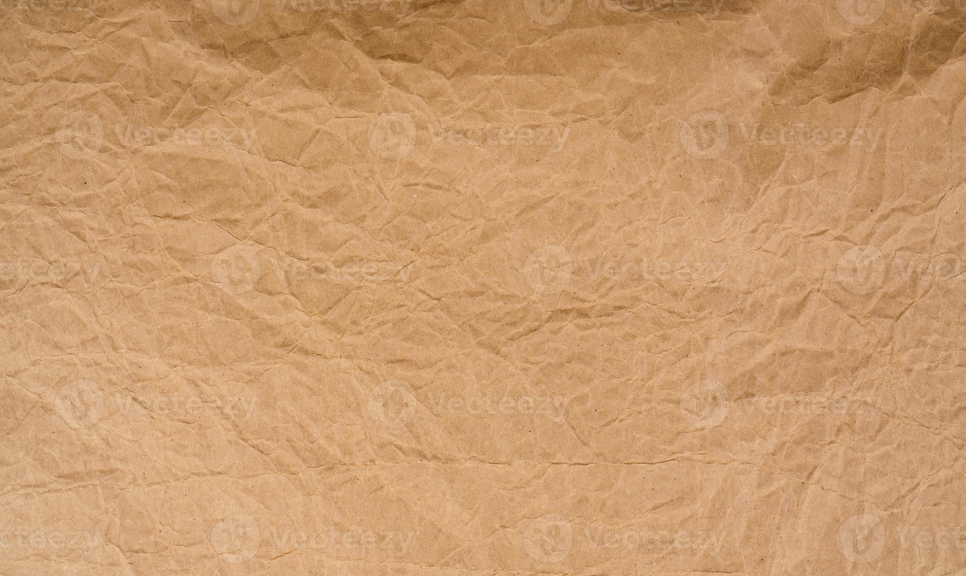 Old wrinkled brown paper texture background. Rough brown kraft paper texture.  Recycle cardboard sheet. Rustic background pattern design. Closeup crumpled  paper bag. Grunge and creased parchment. 8820467 Stock Photo at Vecteezy