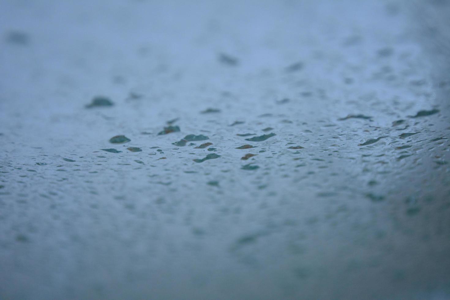 water drop on blue background photo