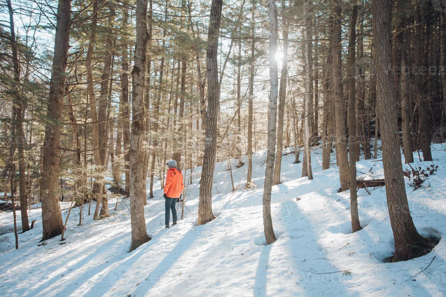 Man hiking in snow photo