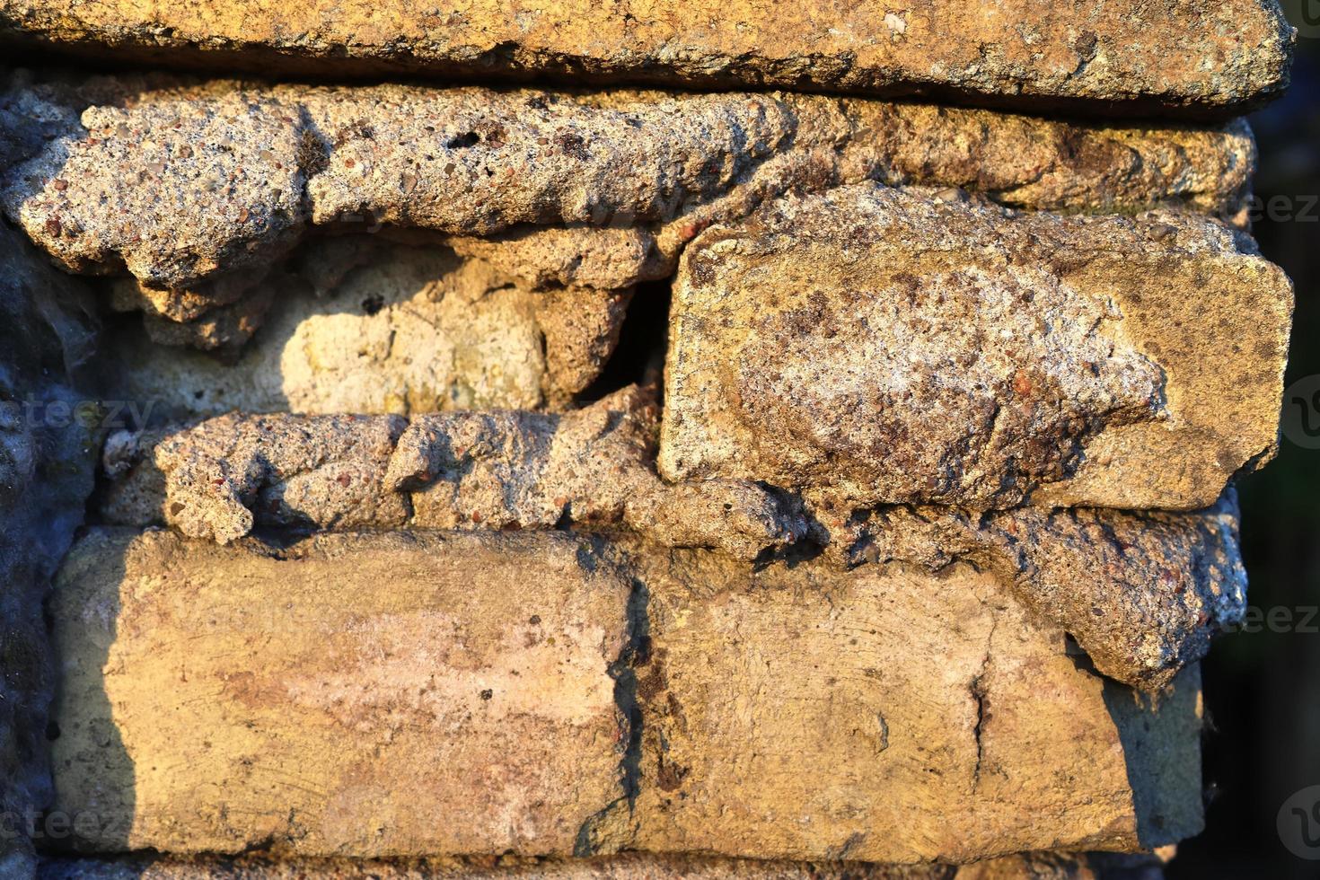 Old brick wall. Texture of old weathered brick wall panoramic background photo