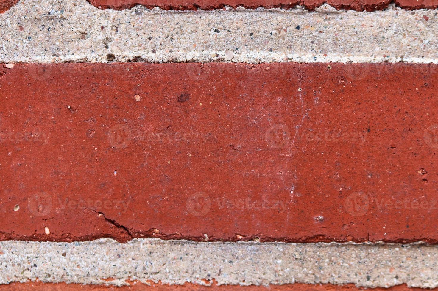 Old brick wall. Texture of old weathered brick wall panoramic background photo