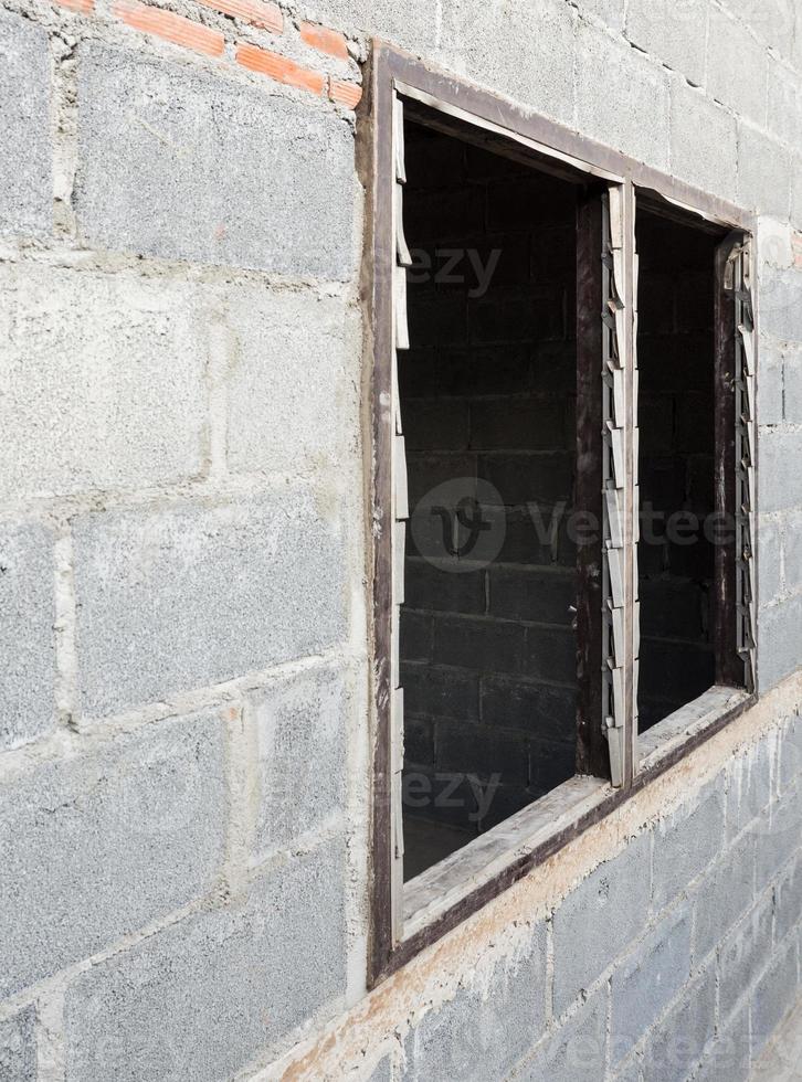Empty wooden frame on the twin window. photo
