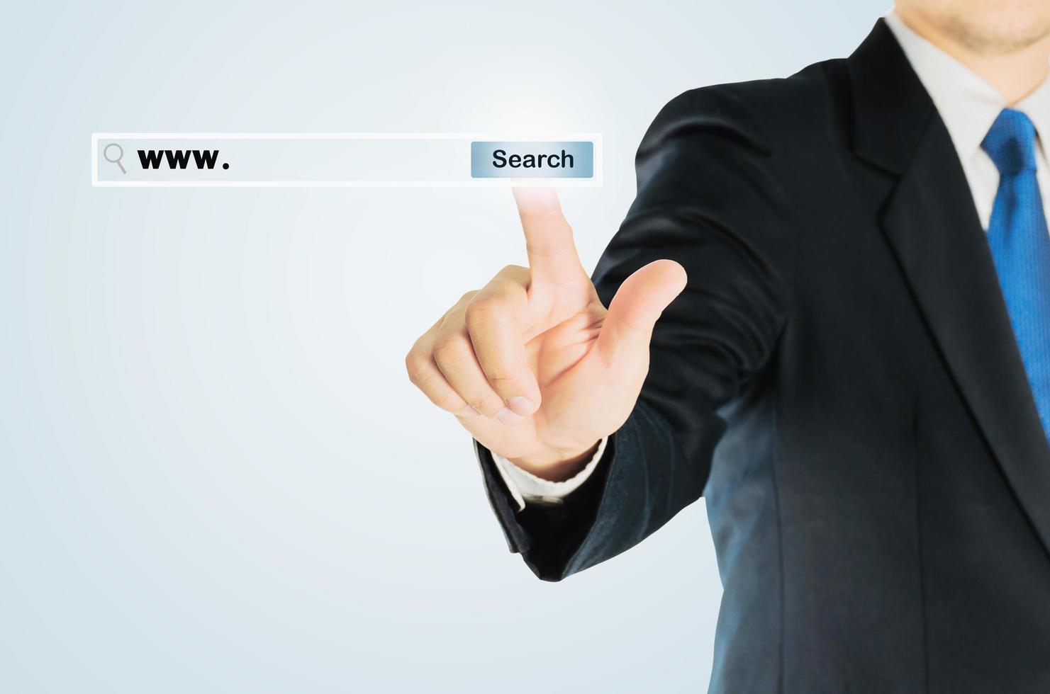 Business man is pushing SEARCH transparent button internet address bar over white background, business technology concept photo