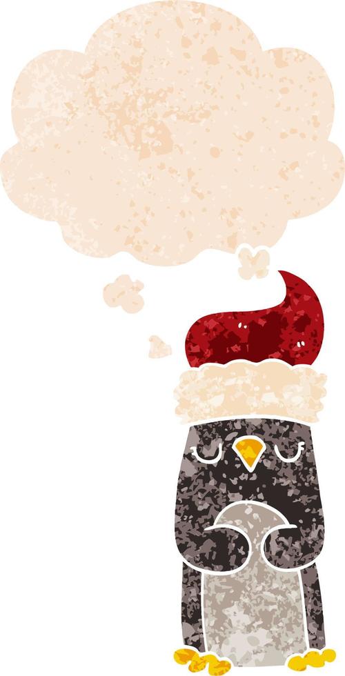 cartoon christmas penguin and thought bubble in retro textured style vector