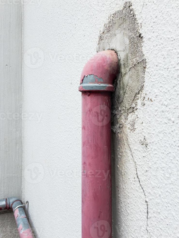 Old metal pipe for fire hydrant. photo