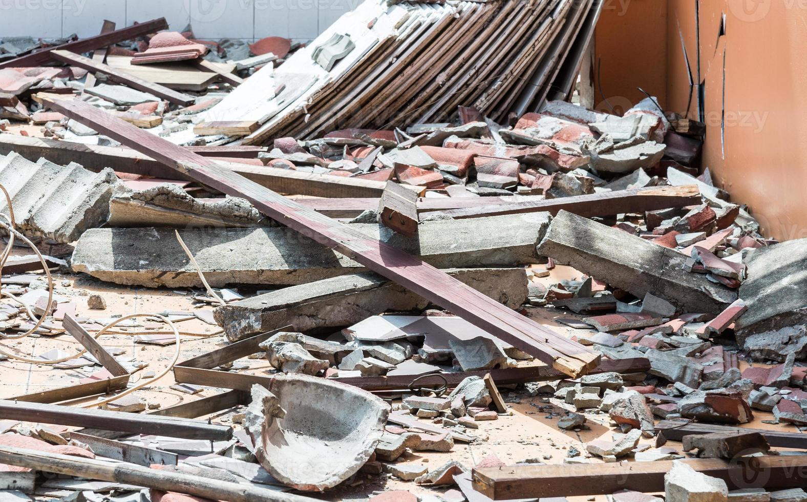 Debris of wooden and  roof tile photo