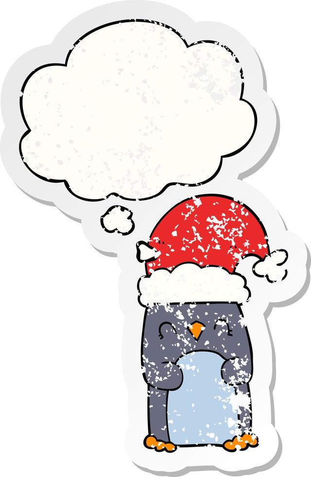 cartoon penguin and thought bubble as a distressed worn sticker vector