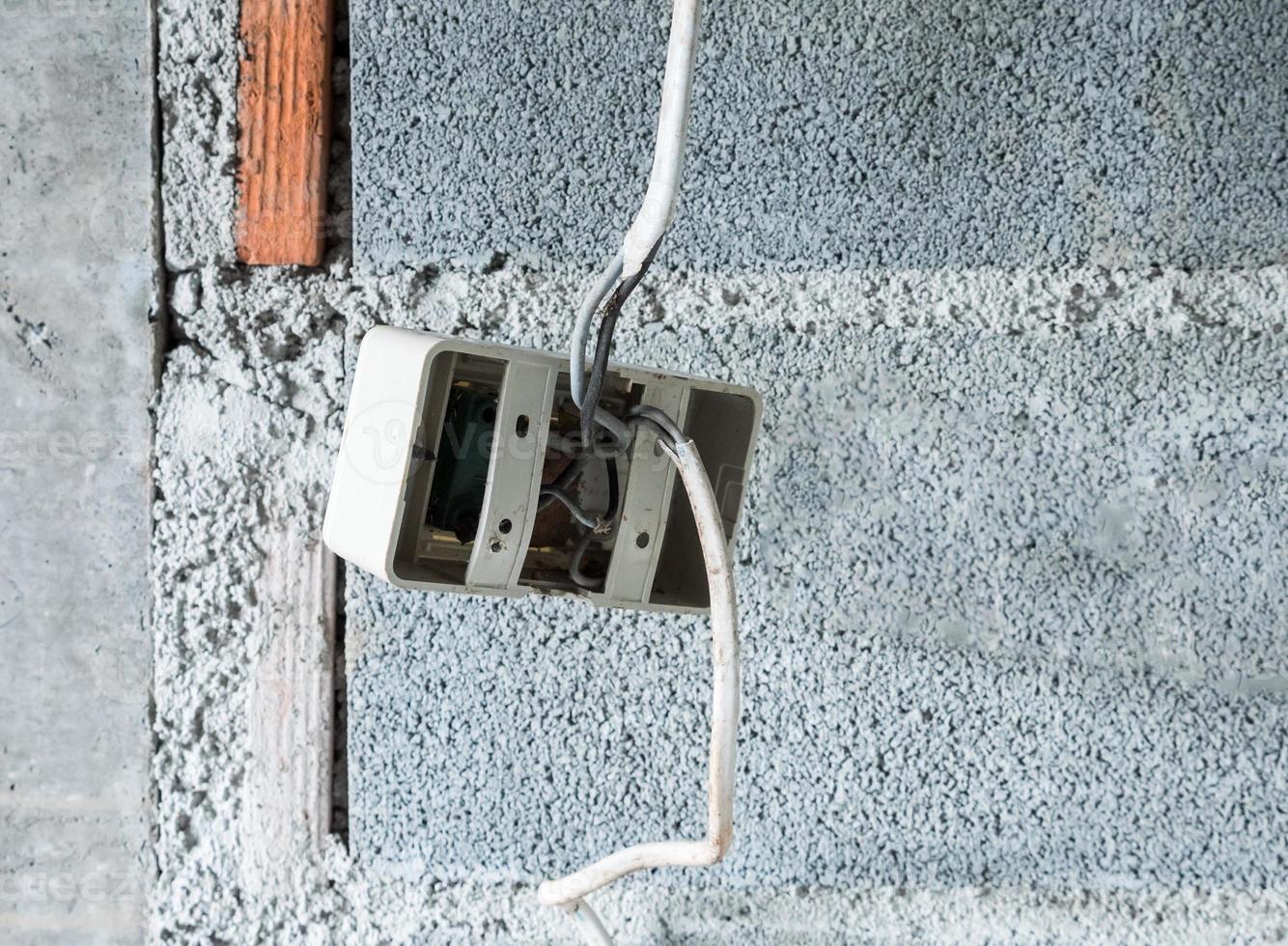 Plastic socket with the electrical wire. photo