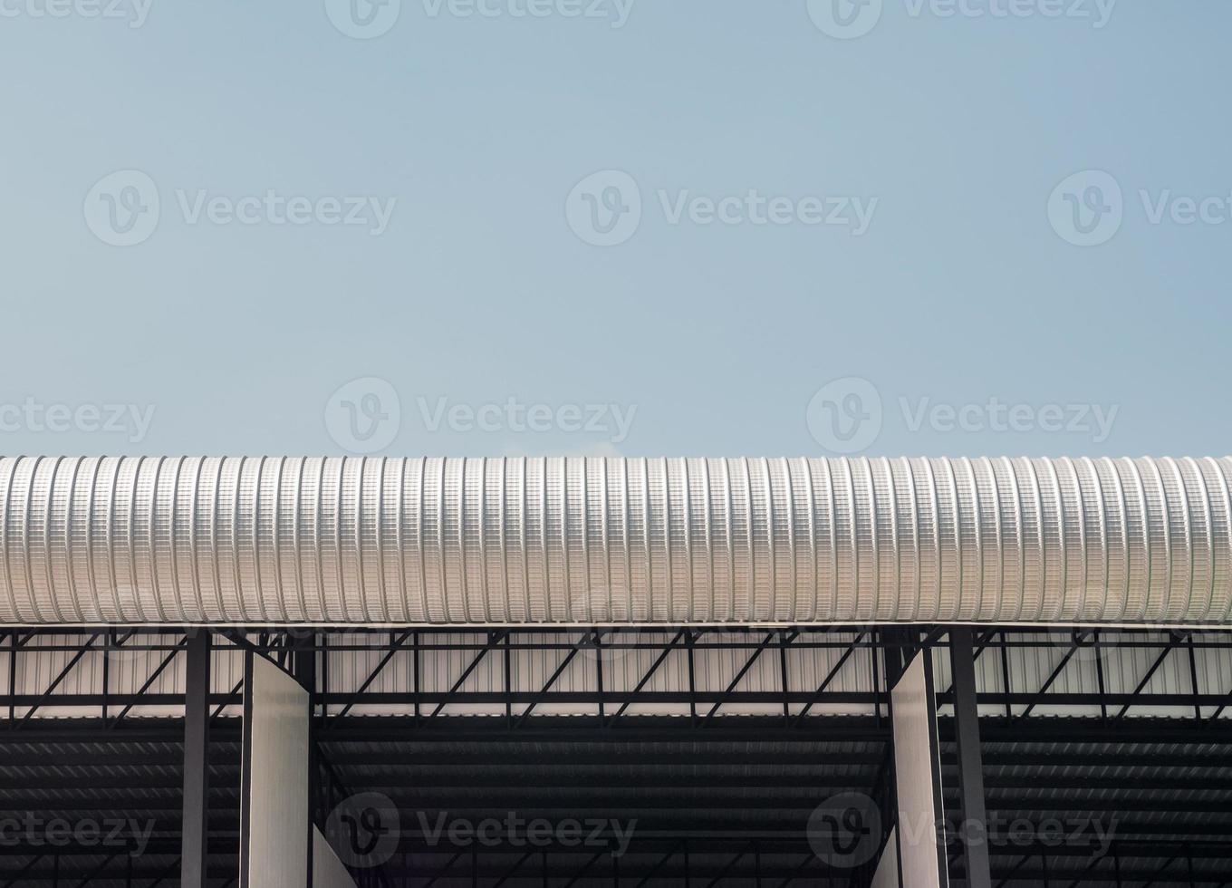 Roll metal roofing on the industry building. photo