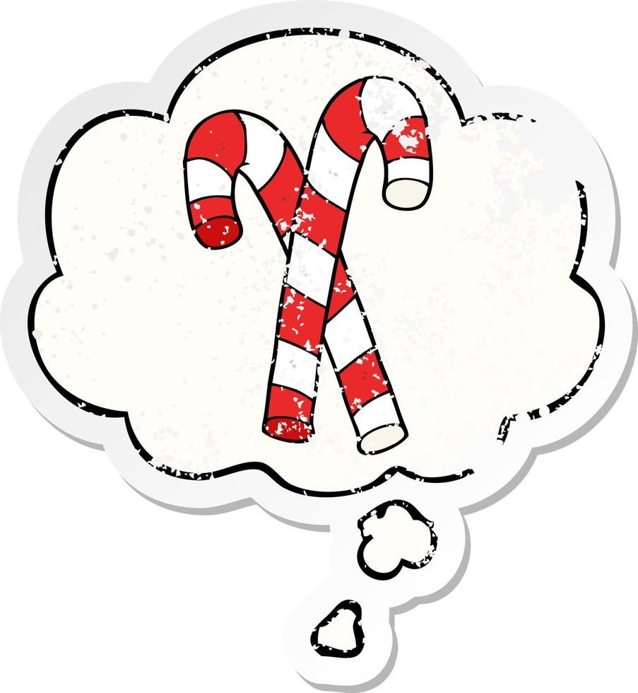 cartoon candy canes and thought bubble as a distressed worn sticker vector