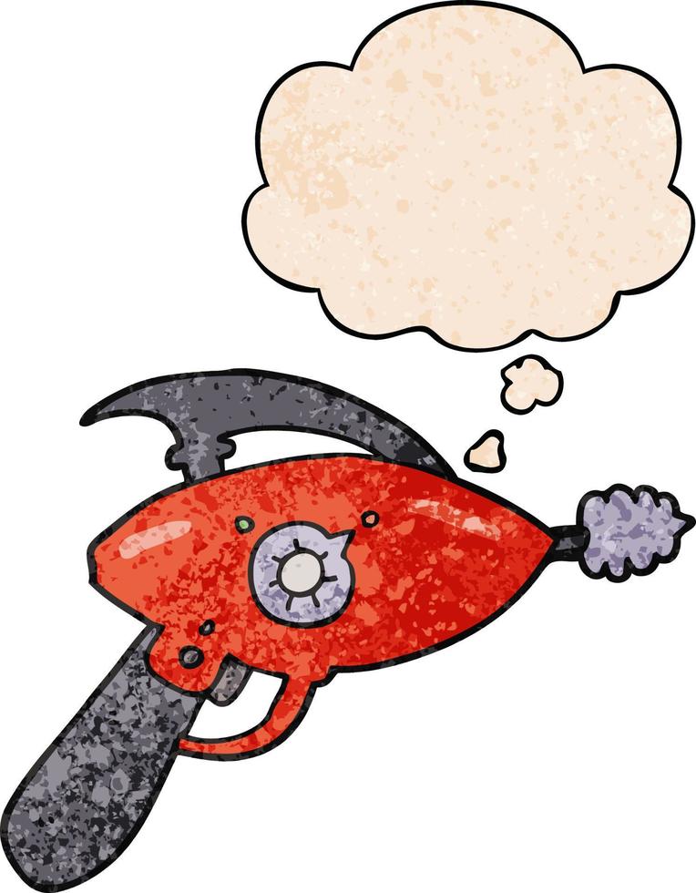 cartoon ray gun and thought bubble in grunge texture pattern style vector