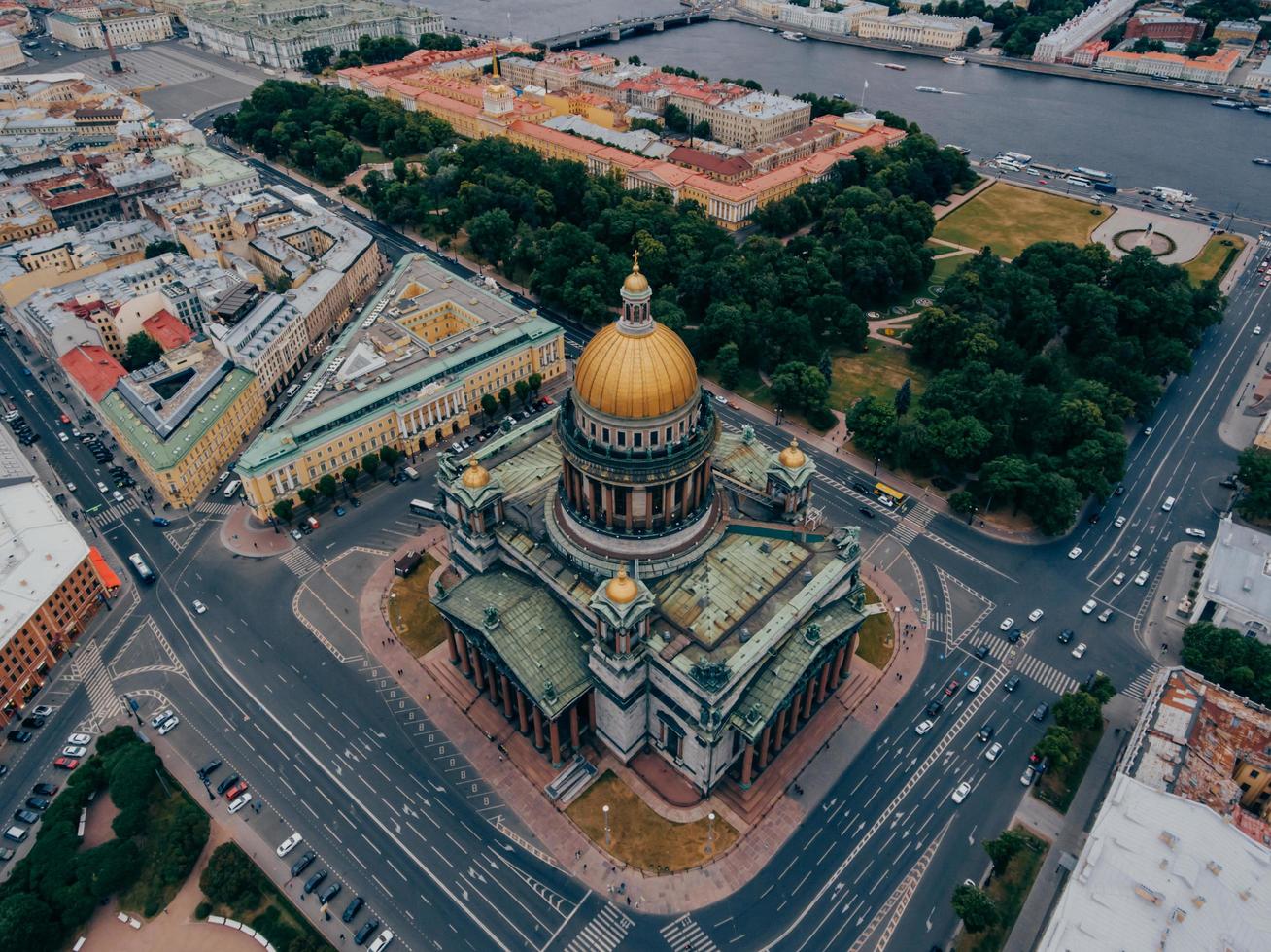 St Petersburg, Russia. View from above of St Isaacs Square in famous city. Busy streets. Cityscape with green trees. Sightseeing concept photo