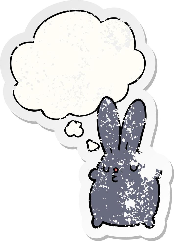 cute cartoon rabbit and thought bubble as a distressed worn sticker vector
