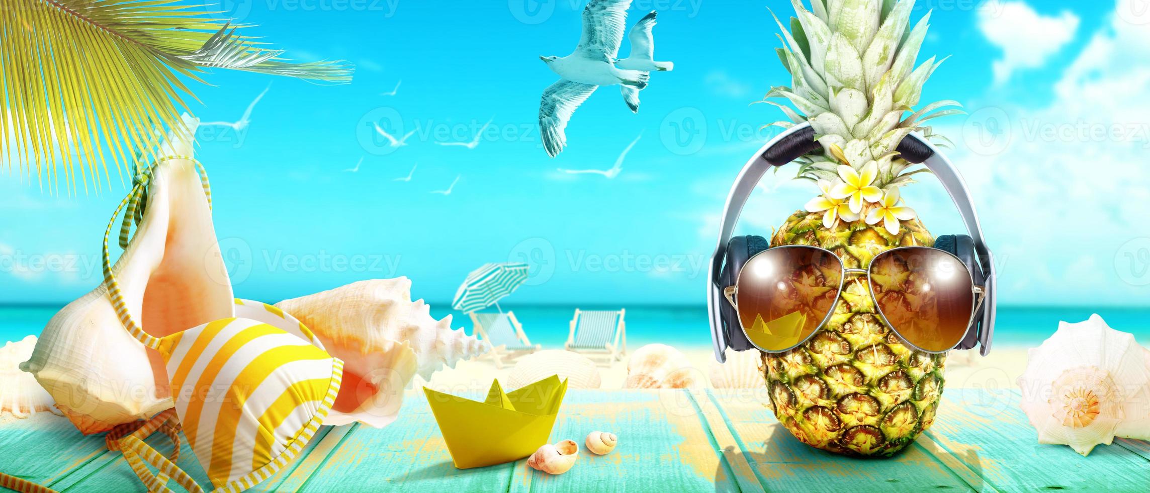 Creative pineapple with sunglasses on summer background. photo