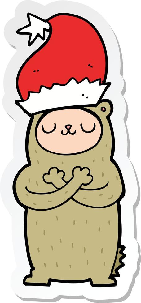 sticker of a cartoon bear wearing christmas hat vector