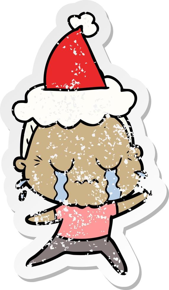 distressed sticker cartoon of a crying old lady wearing santa hat vector