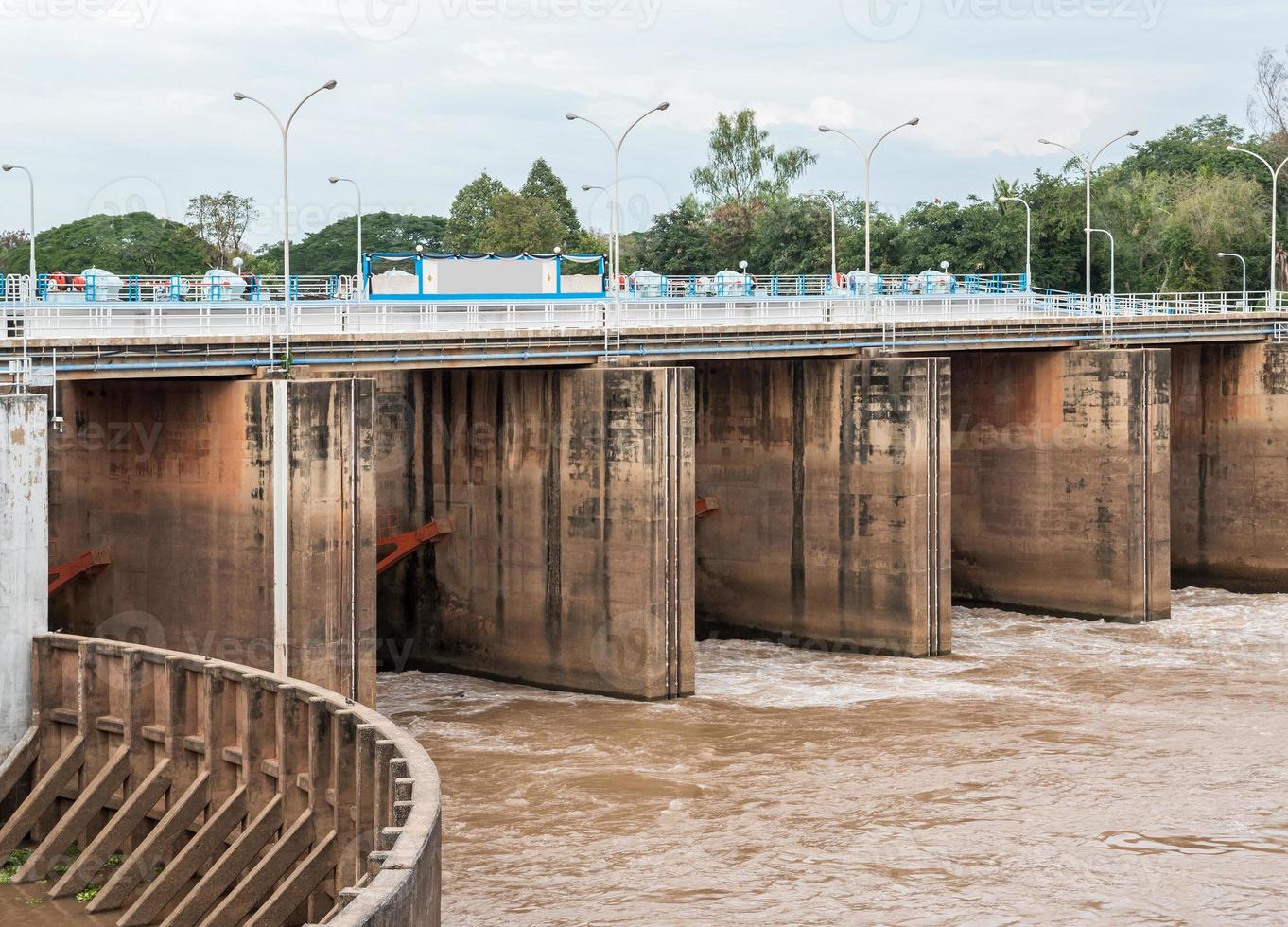 Flood gate of the small concrete dam. photo