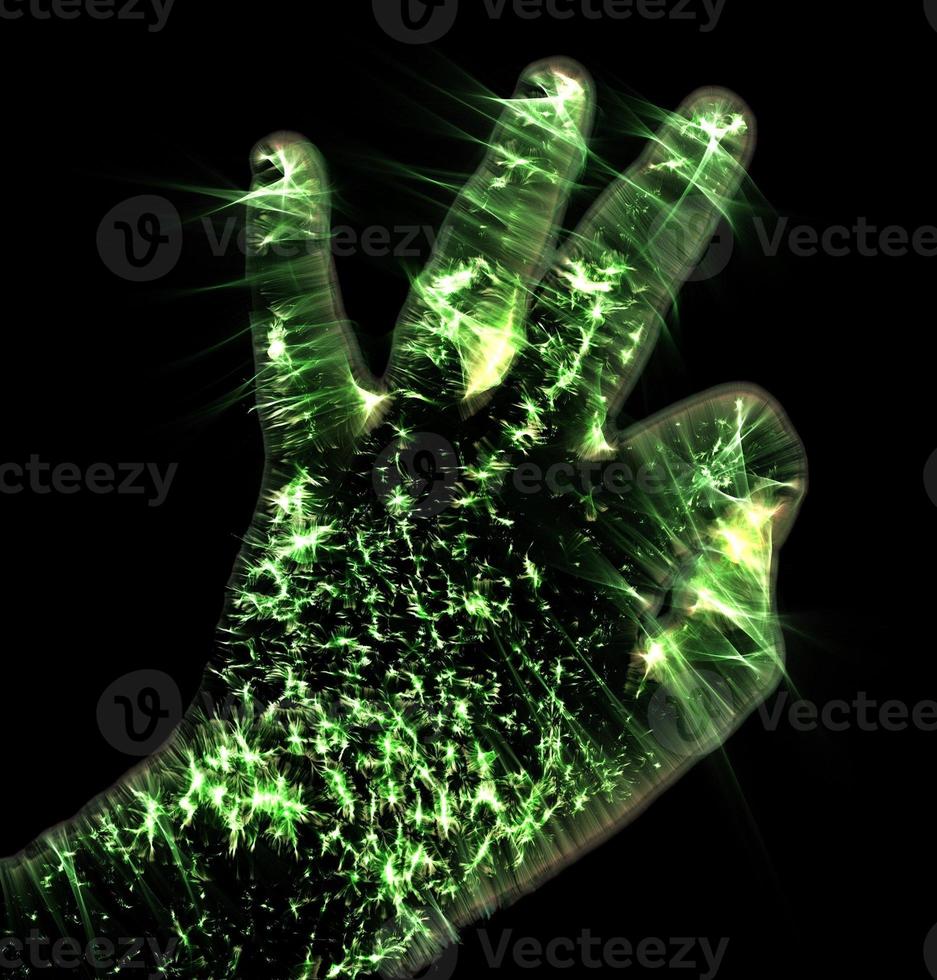 3D-Illustration of a glowing human male hand with a kirlian aura showing symbols photo