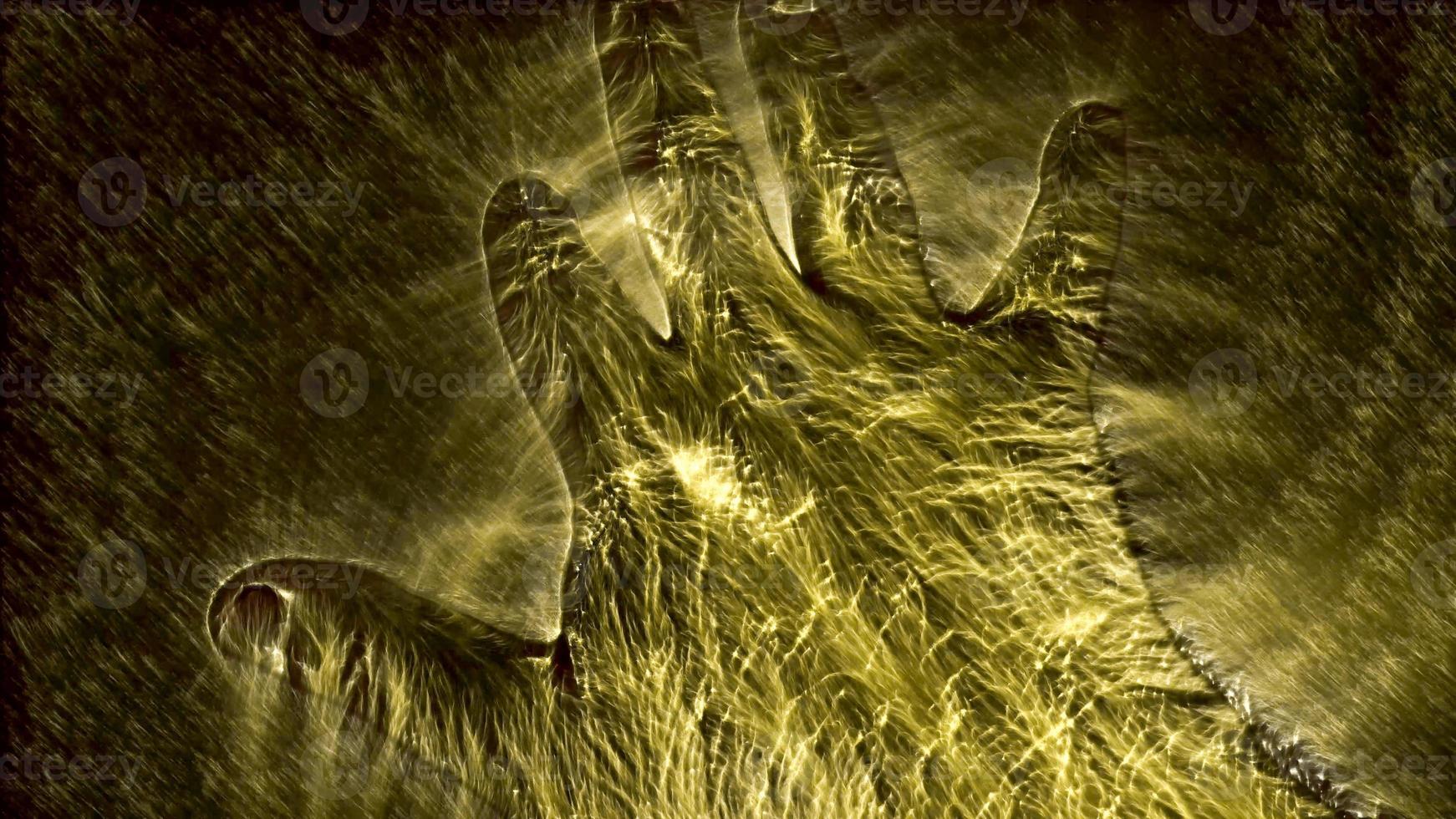 3D-Illustration of a glowing human male hand with a kirlian aura showing symbols photo