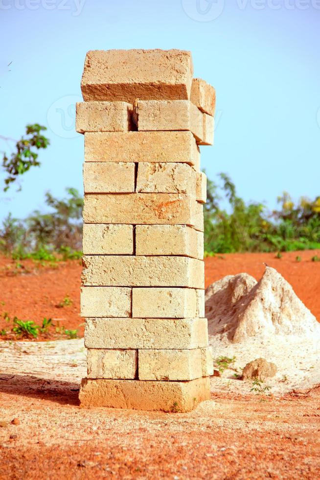 Cement blocks for construction, packed in two rows. Construction blocks at a masonry site. photo