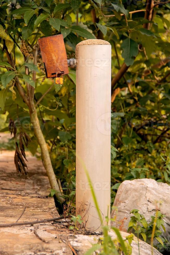 Village Pipe locked to preserve water during the dry season. Locked tap water photo