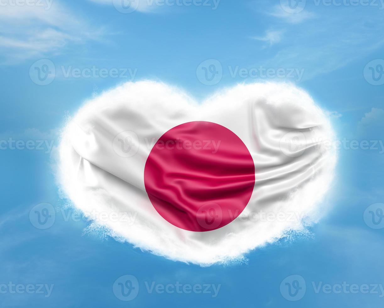 Japanese flag in heart shape in blue sky photo