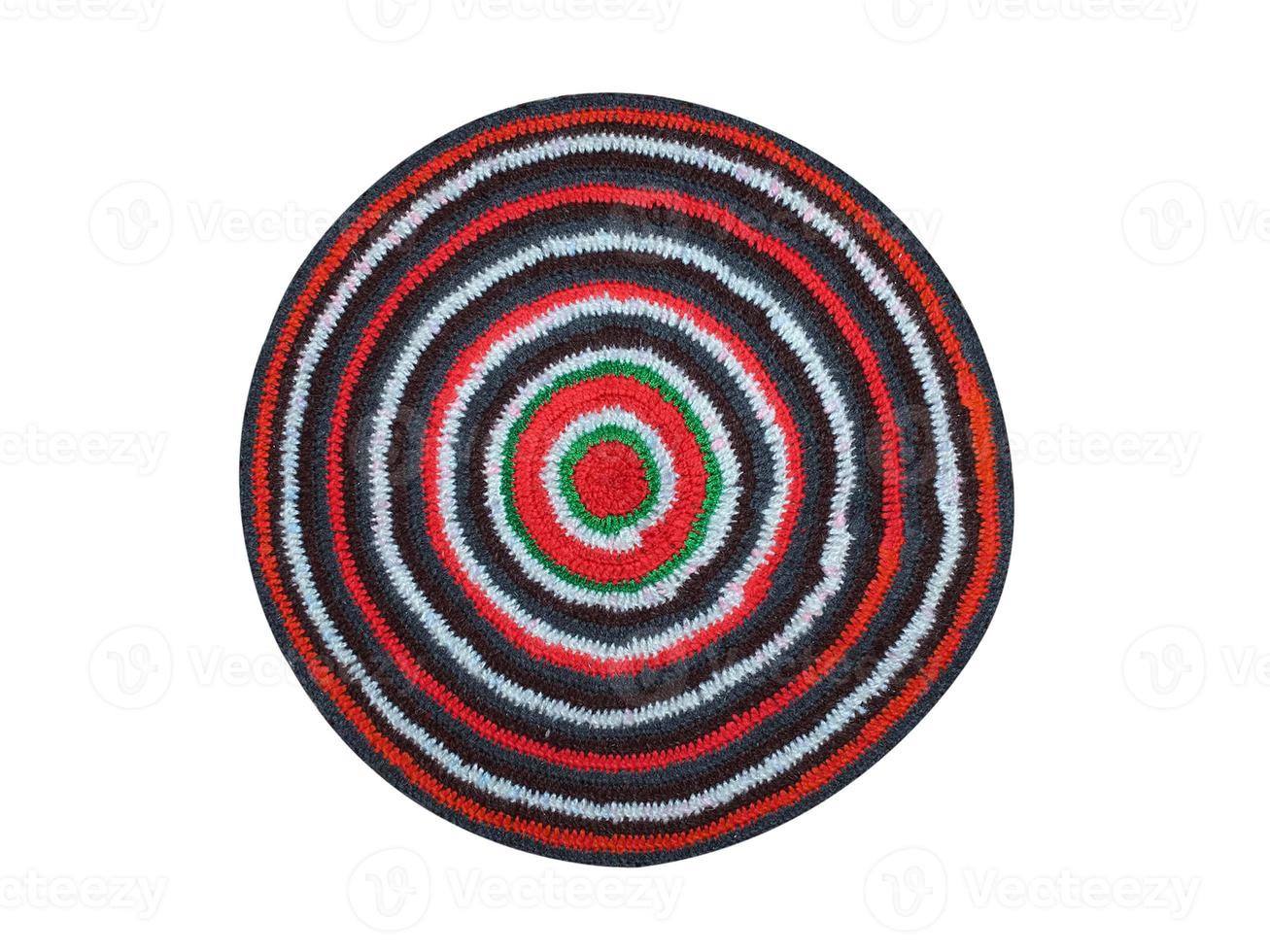 knitted rug in different colors of threads photo