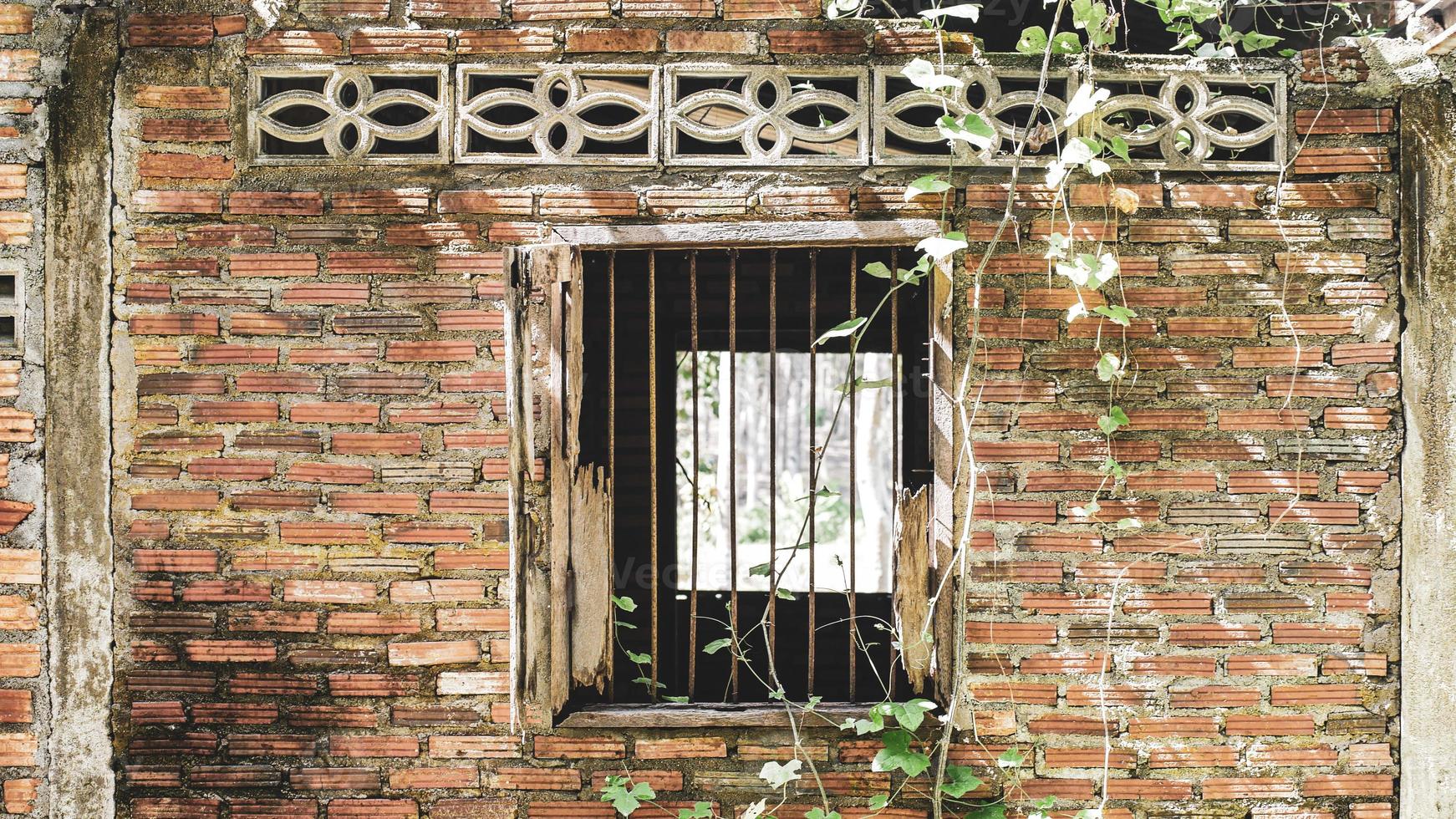 Window of an old abandoned house. Scary. Scary place concept. photo