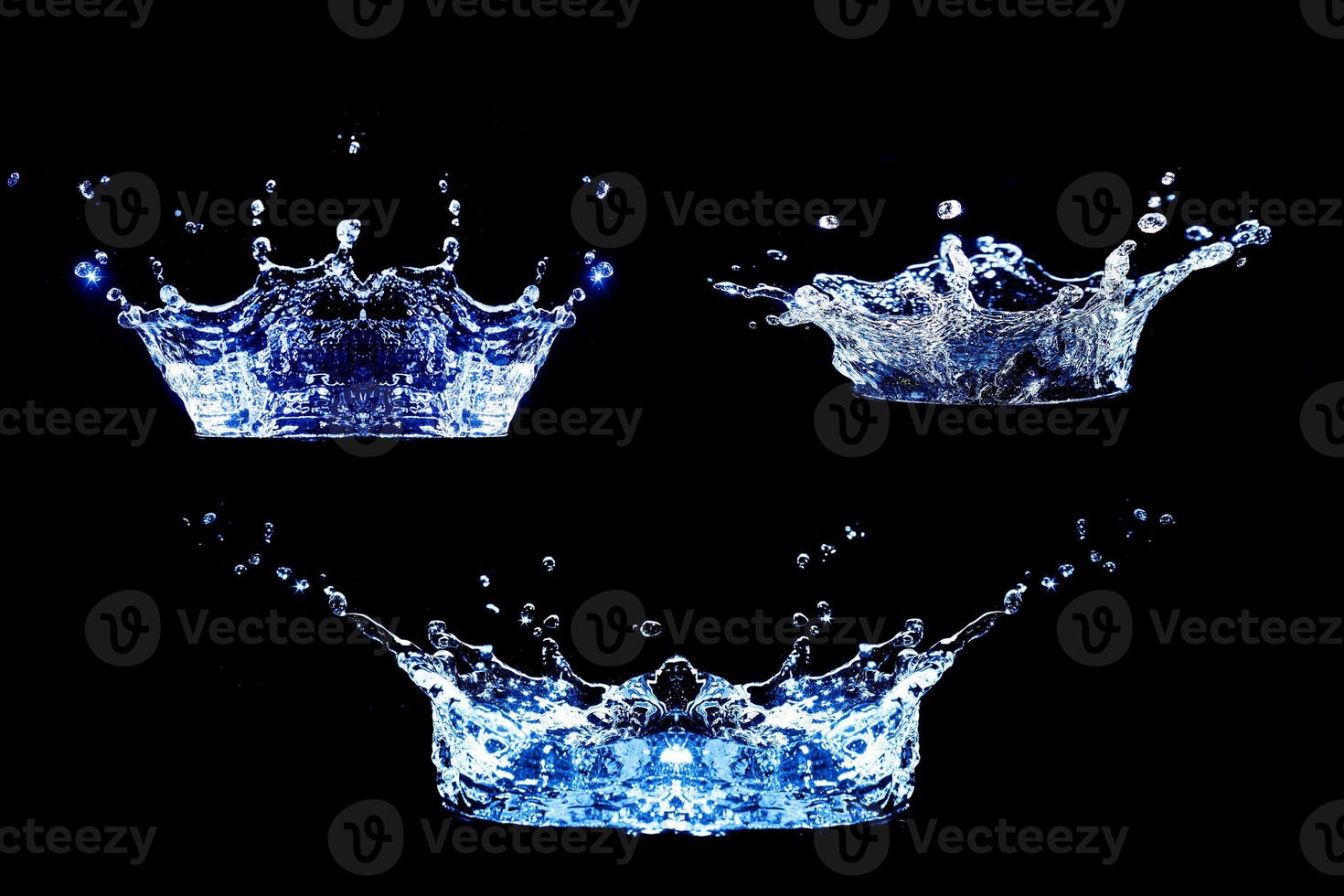 Collection of splashing water on a black background photo