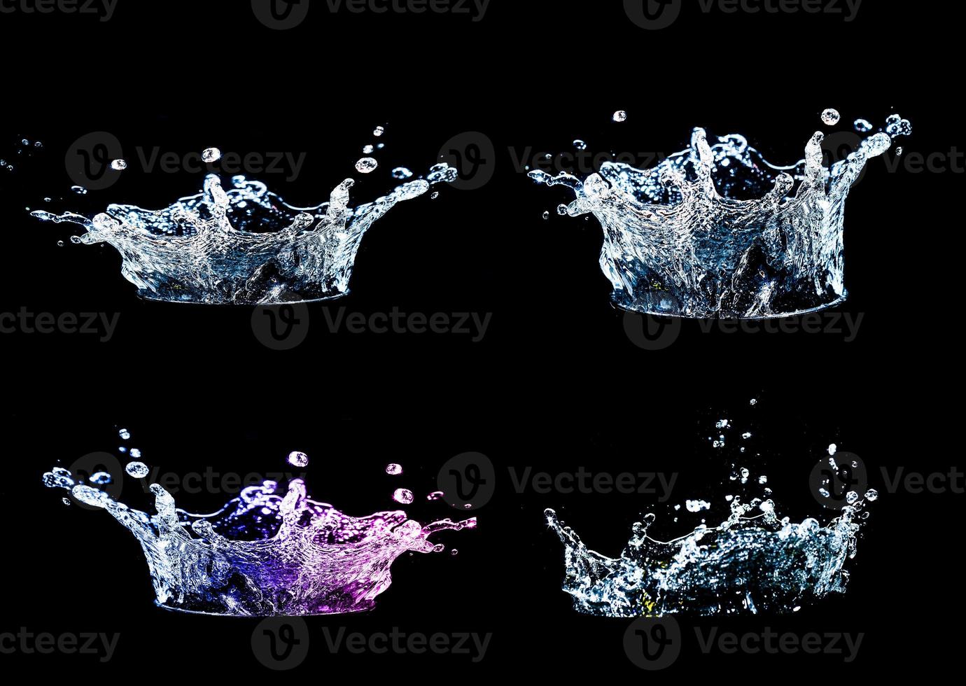 Collection of splashing water on a black background photo