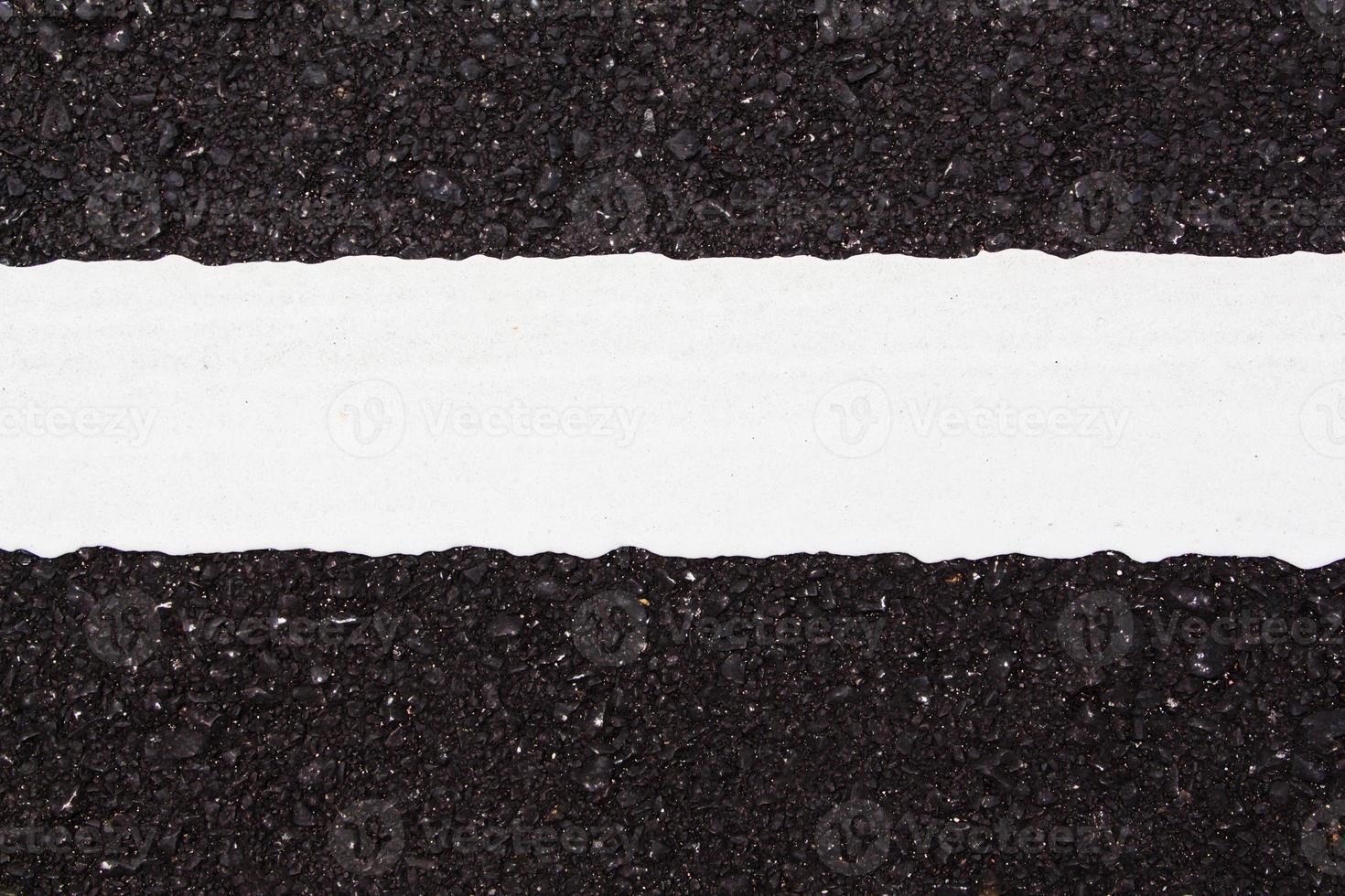 Asphalt dark texture with white line photo