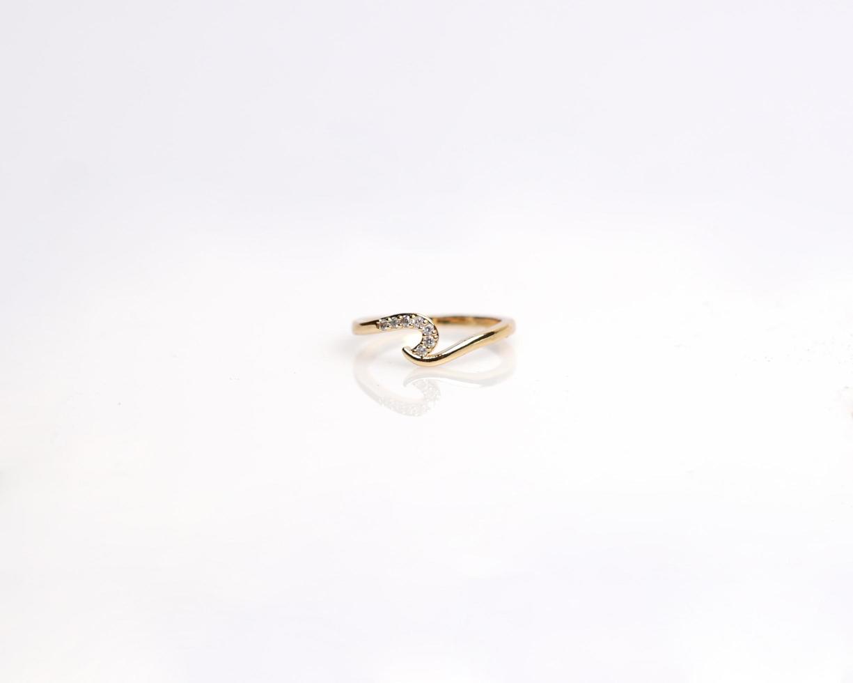 Jewelery ring with diamonds. Wedding rings that have deep meaning and significance. Engagement ring with gemstones. Wedding ring isolated on white background, focus blur. Pair in gold, silver, black. photo