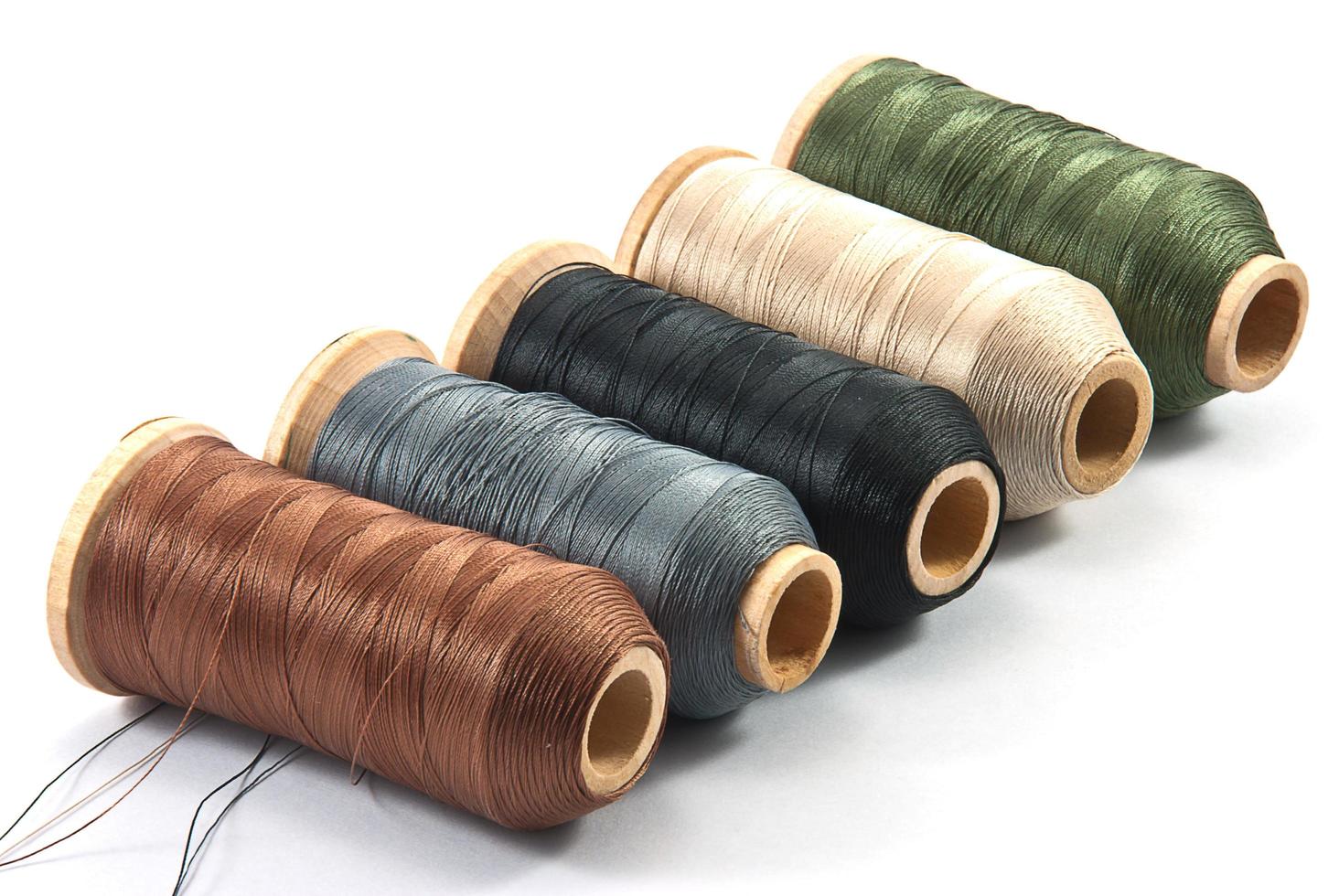 Isolated spools of thread photo