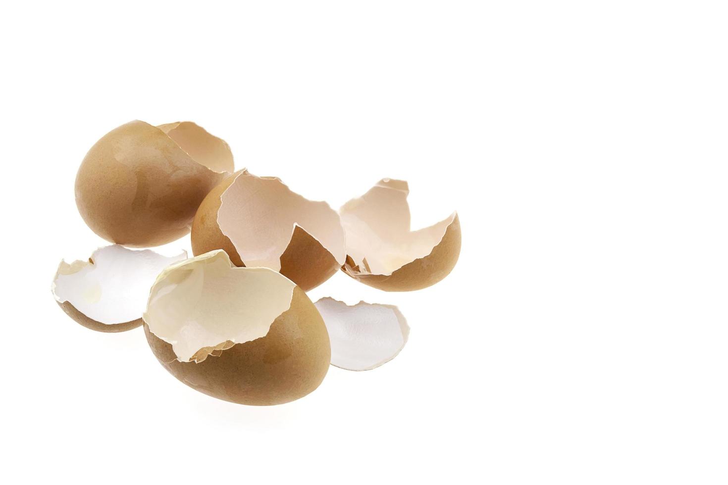 Beaten egg shell isolated over white background, concept for no zero score photo