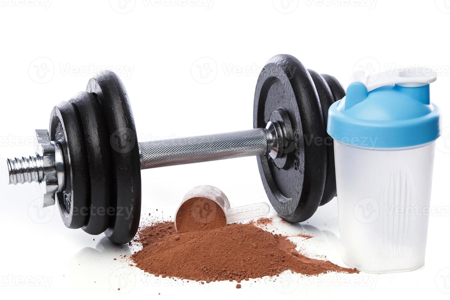 dumbell y proteina en polvo foto