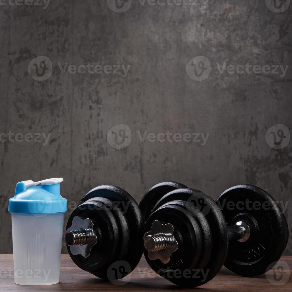 Dumbbells and shaker photo