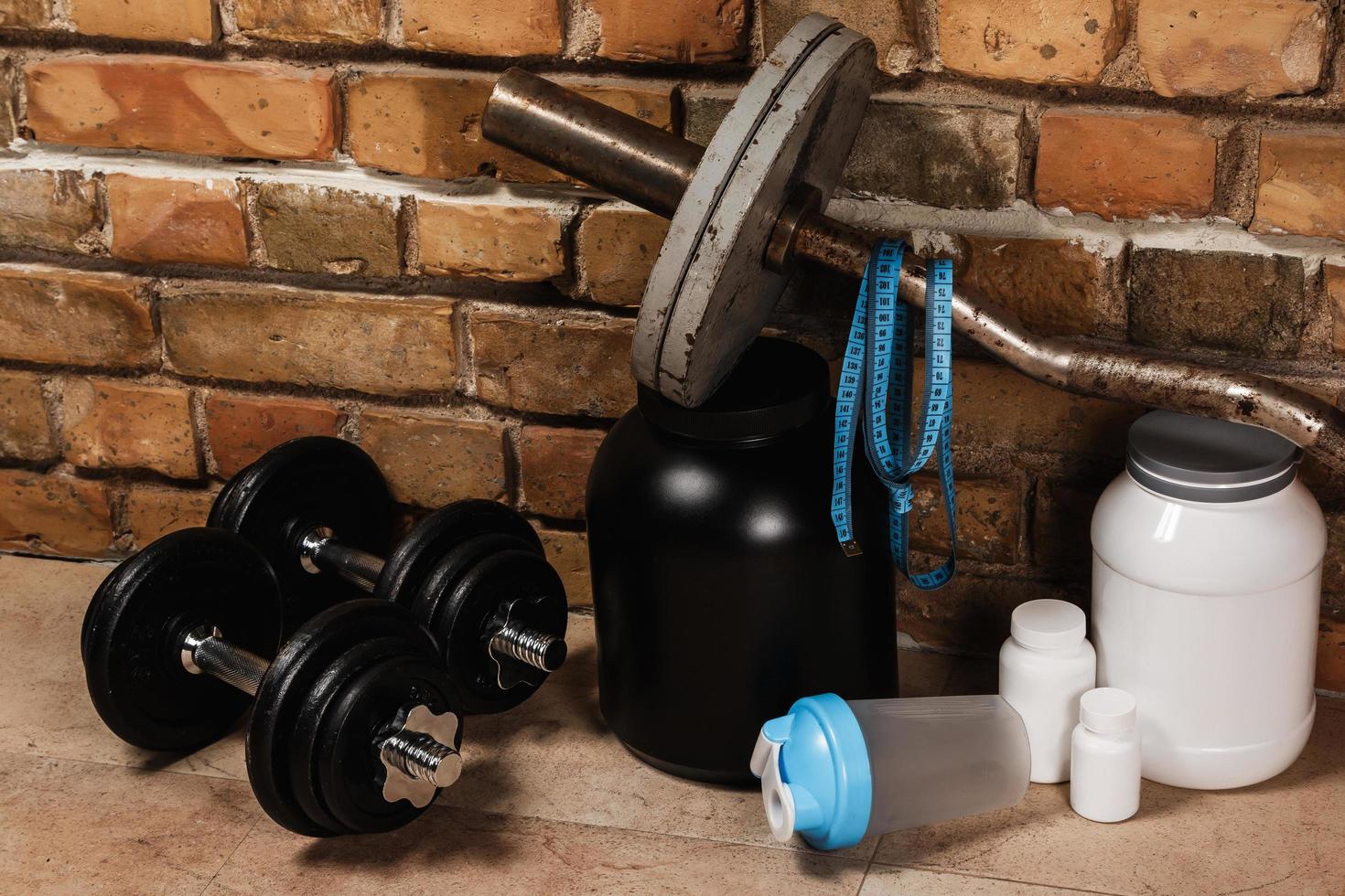 Food supplements and sport equipment photo